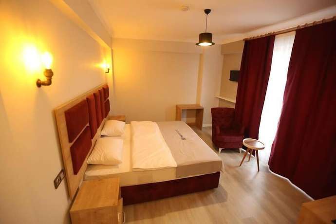 Imagen de la habitación del The Grey Hotel. Foto 9