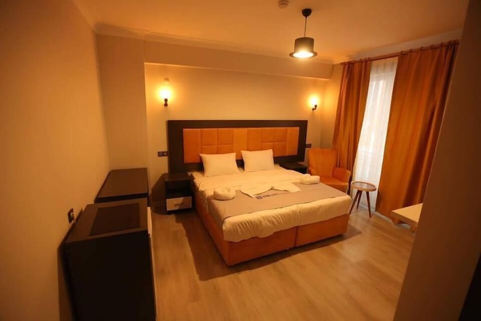 Imagen de la habitación del The Grey Hotel. Foto 13