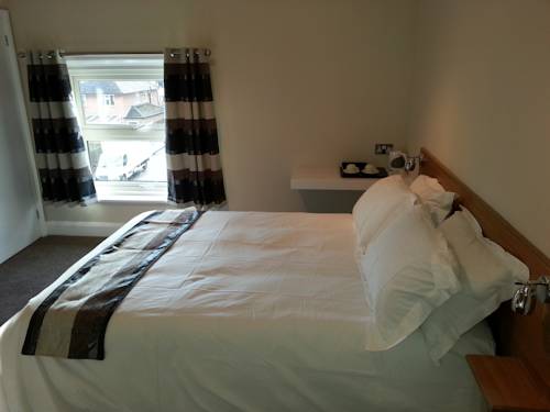 Imagen de la habitación del The Hadley Hotel. Foto 2
