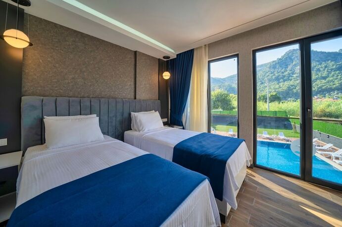 Imagen de la habitación del The Halcyon Rooms and Suites Hotel. Foto 17