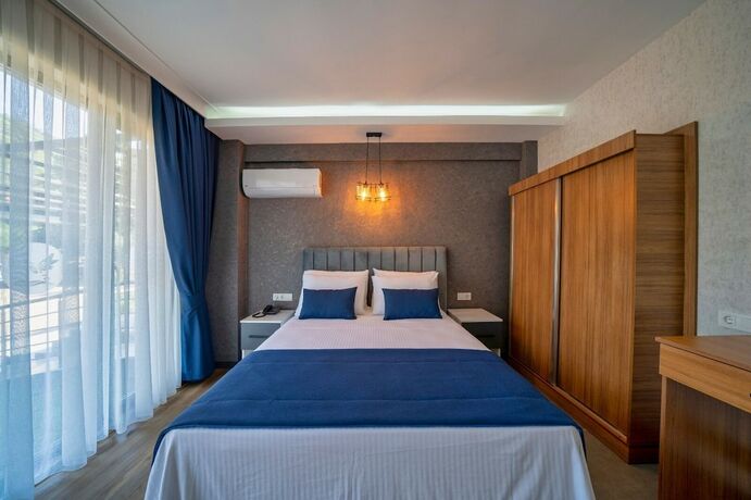 Imagen de la habitación del The Halcyon Rooms and Suites Hotel. Foto 18