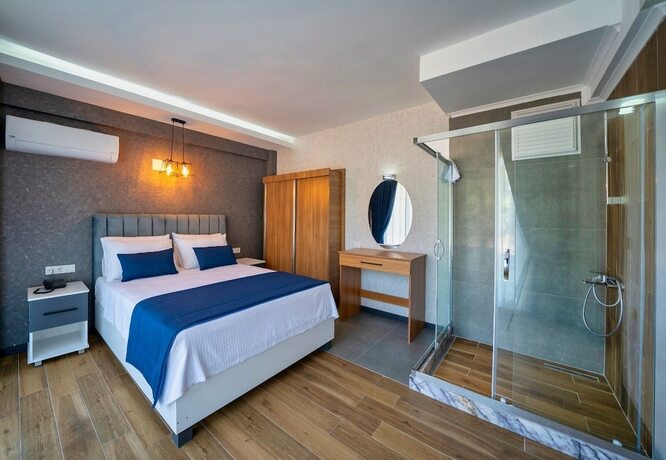 Imagen de la habitación del The Halcyon Rooms and Suites Hotel. Foto 19