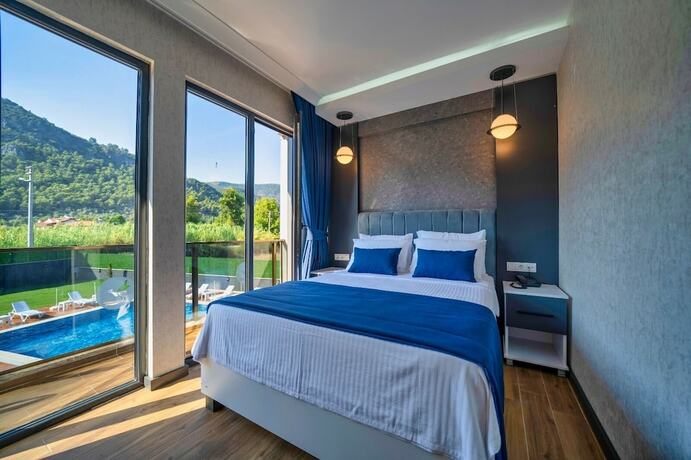 Imagen de la habitación del The Halcyon Rooms and Suites Hotel. Foto 20