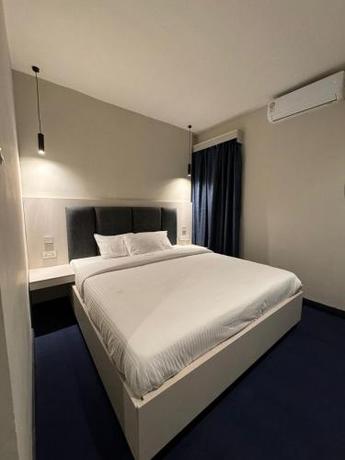 Imagen de la habitación del The Ivory Hotel. Foto 14