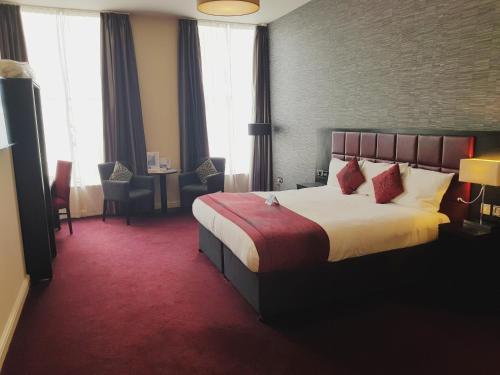 Imagen de la habitación del The John Francis Basset Wetherspoon. Foto 7