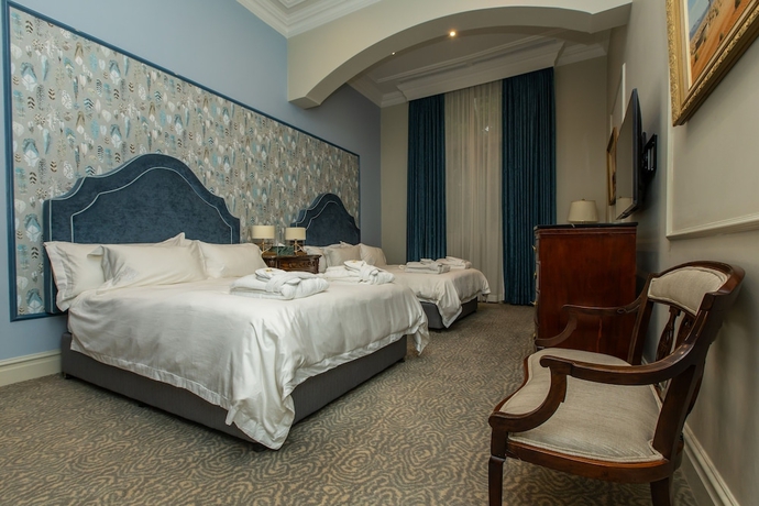 Imagen de la habitación del The Monarch Hotel. Foto 13