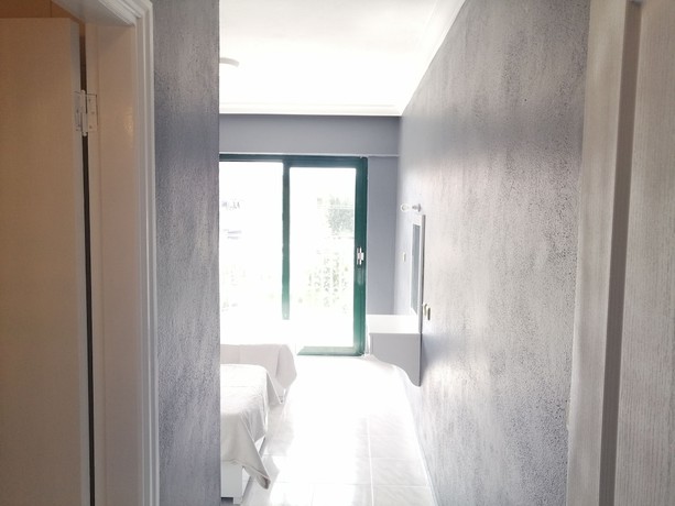 Imagen de la habitación del The Mu Hotel. Foto 5