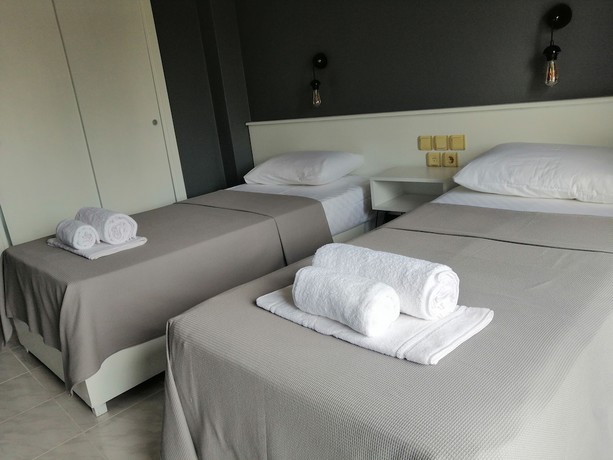 Imagen de la habitación del The Mu Hotel. Foto 6
