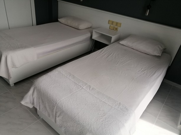 Imagen de la habitación del The Mu Hotel. Foto 8