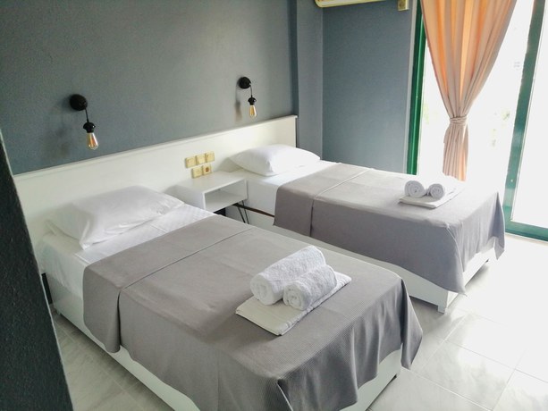 Imagen de la habitación del The Mu Hotel. Foto 11