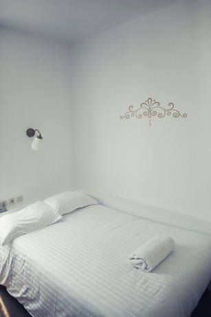 Imagen de la habitación del The Old Hotel Ravel. Foto 7