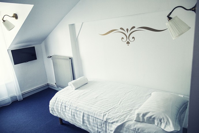 Imagen de la habitación del The Old Hotel Ravel. Foto 11