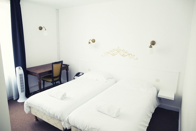 Imagen de la habitación del The Old Hotel Ravel. Foto 14