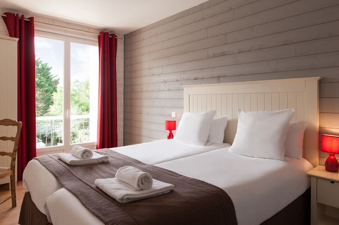 Imagen de la habitación del The Originals Boutique, H&ocirc;tel de la Plage. Foto 10