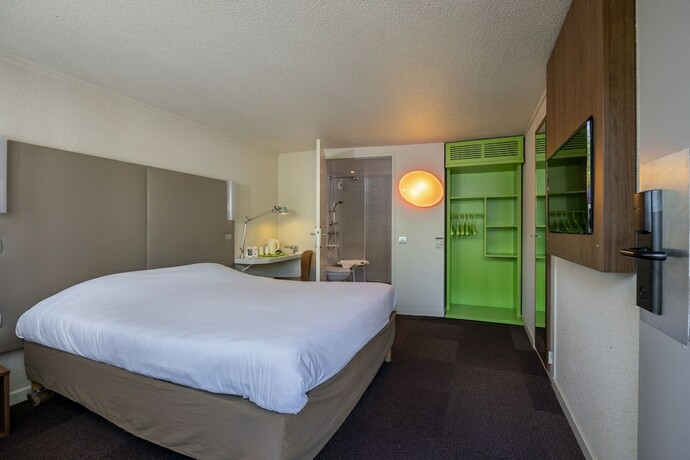 Imagen de la habitación del The Originals City,h&ocirc;tel M&acirc;con Nord. Foto 16