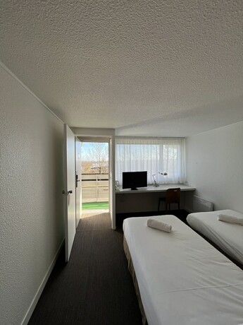 Imagen de la habitación del The Originals City,h&ocirc;tel M&acirc;con Nord. Foto 18