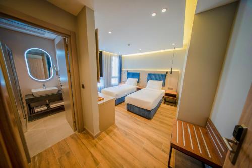 Imagen de la habitación del The Palm Bosphorus Hotel. Foto 15