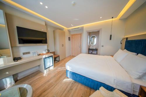 Imagen de la habitación del The Palm Bosphorus Hotel. Foto 16