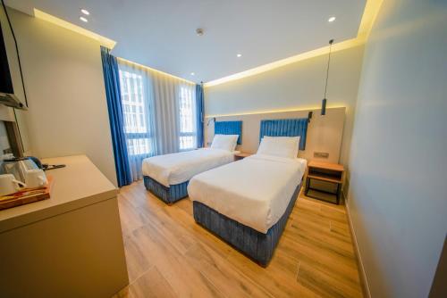 Imagen de la habitación del The Palm Bosphorus Hotel. Foto 18