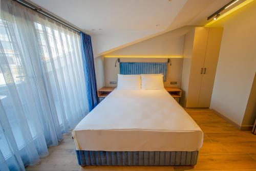 Imagen de la habitación del The Palm Bosphorus Hotel. Foto 20
