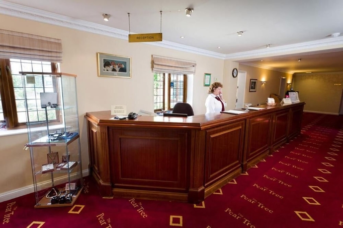 Imagen de los interiores del The Pear Tree Inn and Country Hotel. Foto 10