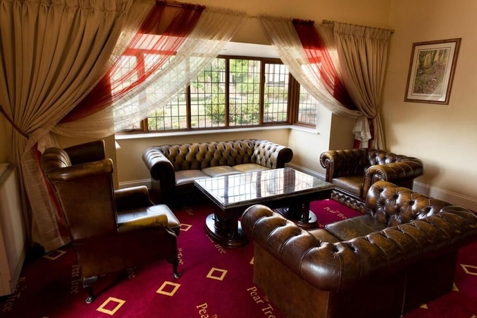 Imagen de los interiores del The Pear Tree Inn and Country Hotel. Foto 11