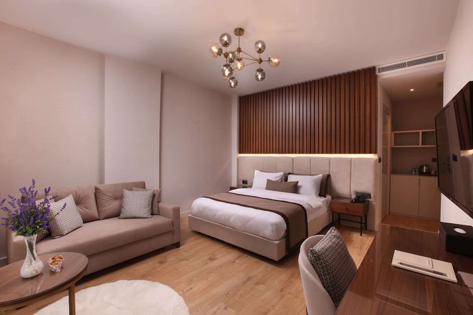 Imagen de la habitación del The Pearl Suites. Foto 2