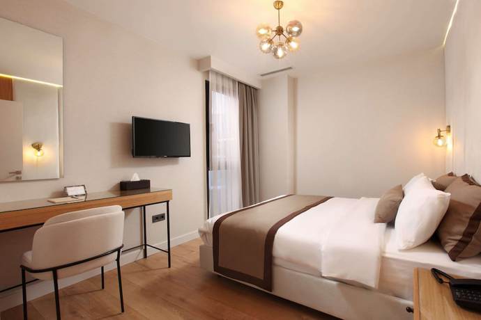 Imagen de la habitación del The Pearl Suites. Foto 10