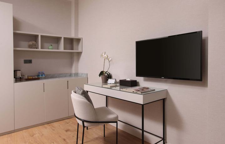 Imagen de la habitación del The Pearl Suites. Foto 12