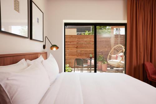 Imagen de la habitación del The Postmark Hotel. Foto 18