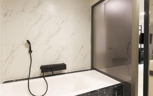 Imagen de la habitación del The Propin Hotel. Foto 16
