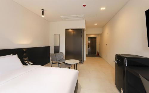 Imagen de la habitación del The Propin Hotel. Foto 19