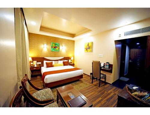 Imagen de la habitación del The Red Velvet Hotel Samarpan, Patna. Foto 18