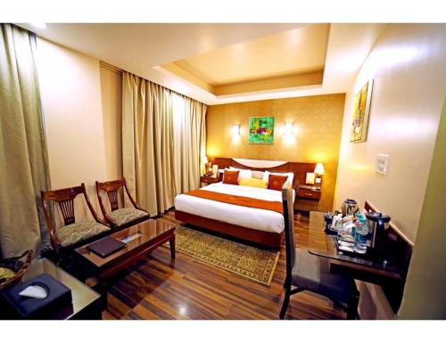 Imagen de la habitación del The Red Velvet Hotel Samarpan, Patna. Foto 20