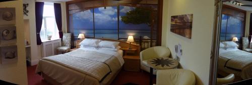 Imagen de la habitación del The Regal Hotel. Foto 10