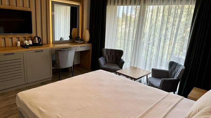 Imagen de la habitación del The Rest Port Agento. Foto 18