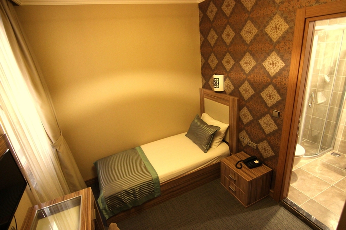 Imagen de la habitación del The Rise Aron Business Hotel Merter. Foto 9