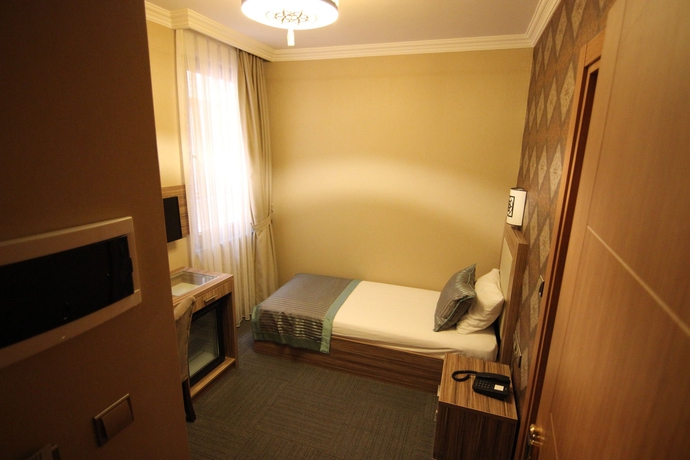 Imagen de la habitación del The Rise Aron Business Hotel Merter. Foto 11