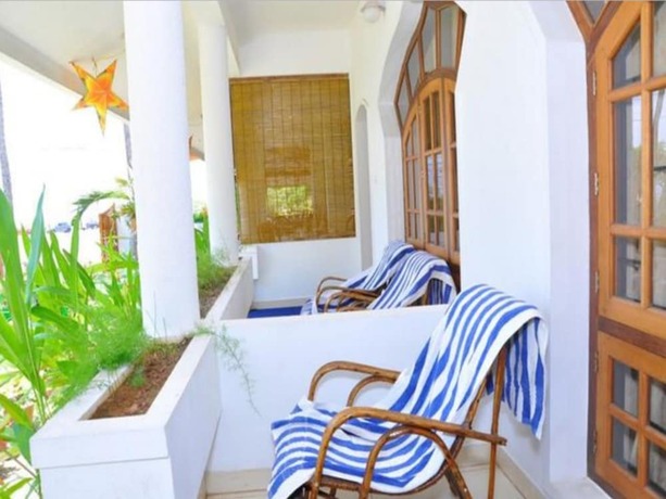 Imagen de la habitación del The Sanctum Spring Beach Resort. Foto 15