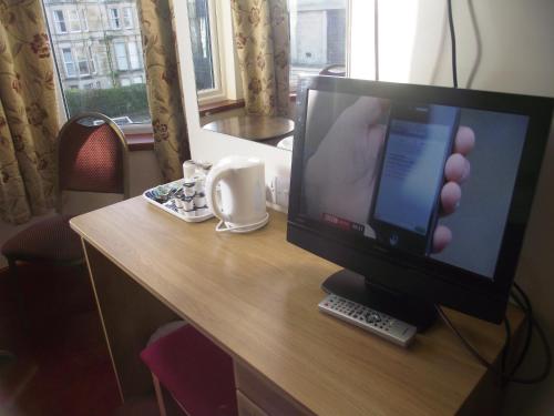 Imagen de la habitación del The Sandringham Hotel. Foto 9