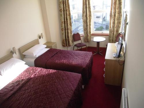 Imagen de la habitación del The Sandringham Hotel. Foto 10