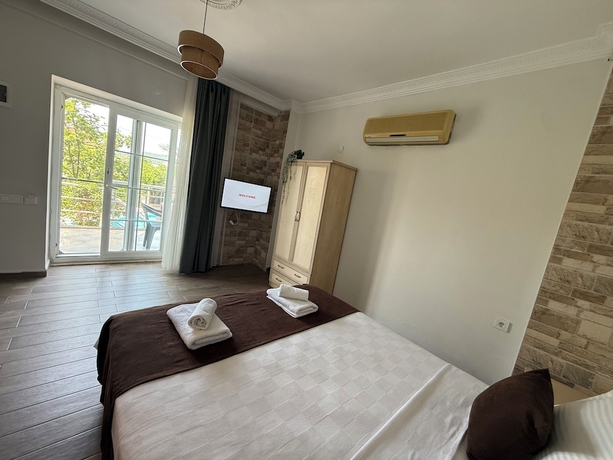 Imagen de la habitación del The Sweet Escape Apart Hotel. Foto 14