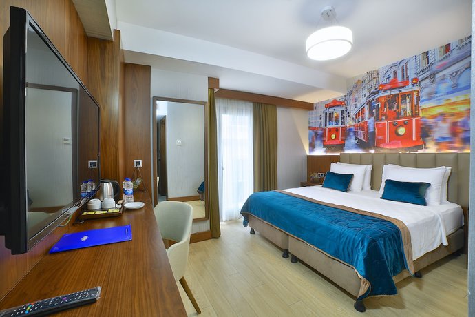 Imagen de la habitación del The Tango Hotel Taksim. Foto 16