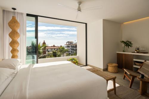 Imagen de la habitación del The Tryst Puerto Vallarta. Foto 3