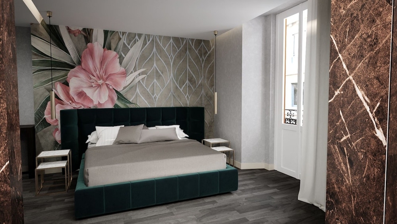 Imagen de la habitación del The Unique Hotel. Foto 7