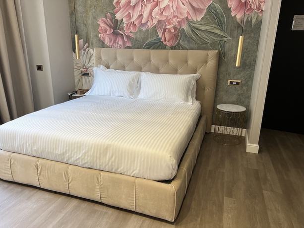 Imagen de la habitación del The Unique Hotel. Foto 8