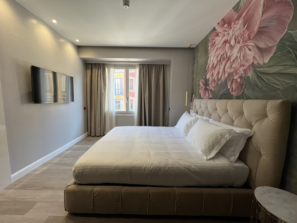 Imagen de la habitación del The Unique Hotel. Foto 9