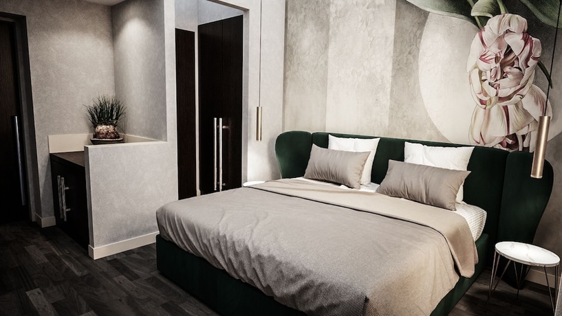 Imagen de la habitación del The Unique Hotel. Foto 12