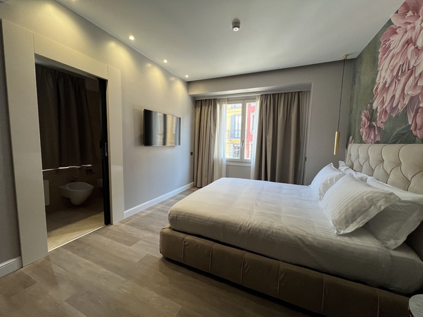 Imagen de la habitación del The Unique Hotel. Foto 13