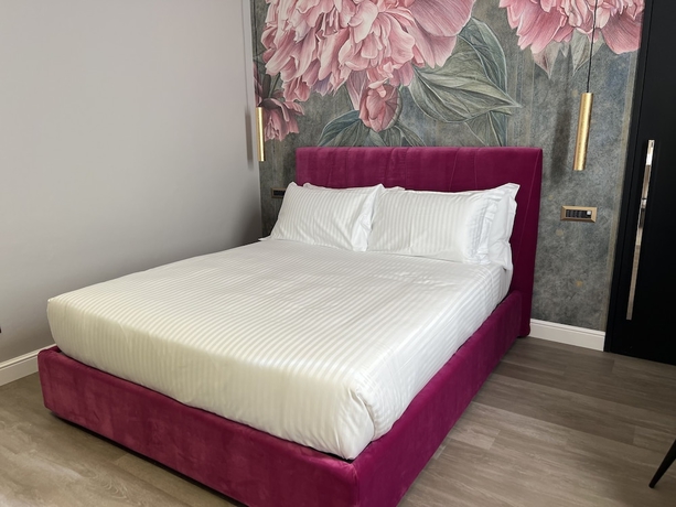 Imagen de la habitación del The Unique Hotel. Foto 17